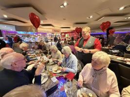 Magician Freddie Wilkinson performing table magic